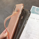 Glitter Powder Shining Transparent Soft Silicone Wrist Strap Phone Case Back Cover for iPhone 12/12 pro/12 mini/ 12 pro max/11 Pro Max/11 Pro/11/XS Max/XR/XS/X/8 Plus/8/7 Plus/7/6s Plus/6s/6 Plus/6 - halloladies
